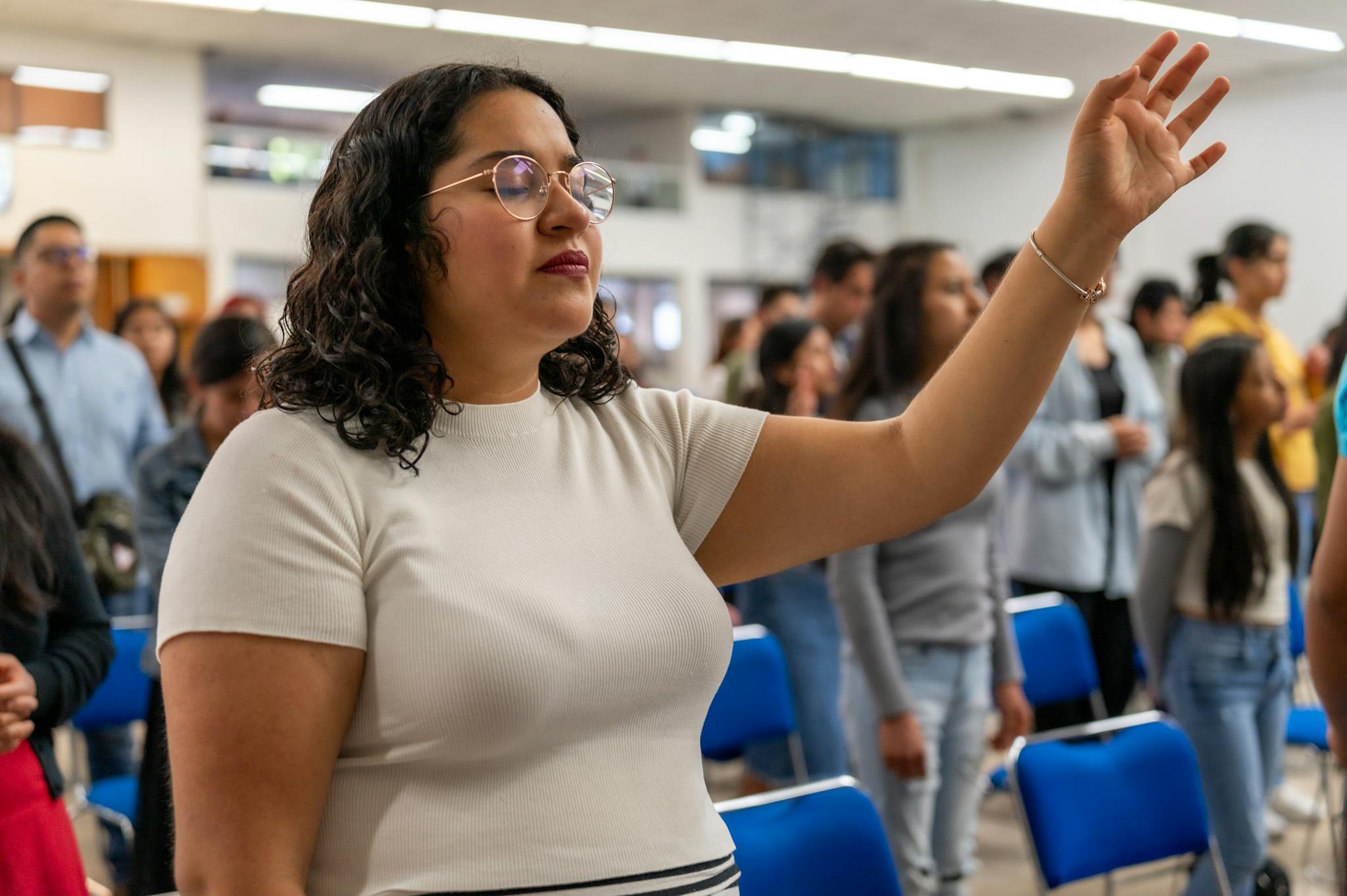 People of various ages worship together in a church in Ciudad de México.